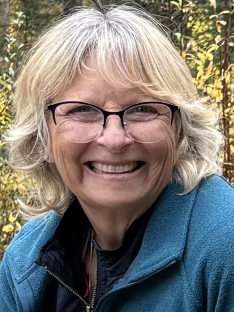 Nona smiling outdoors
